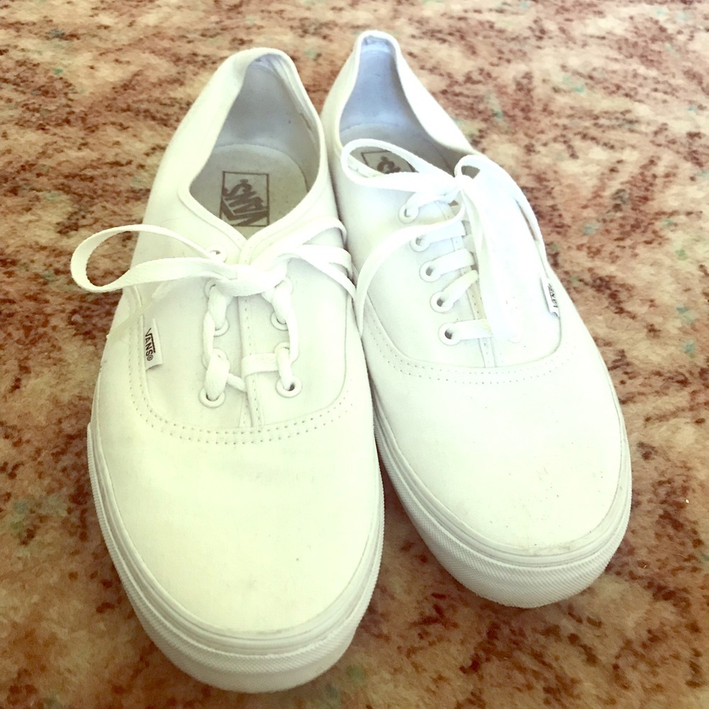 Men’s white vans.